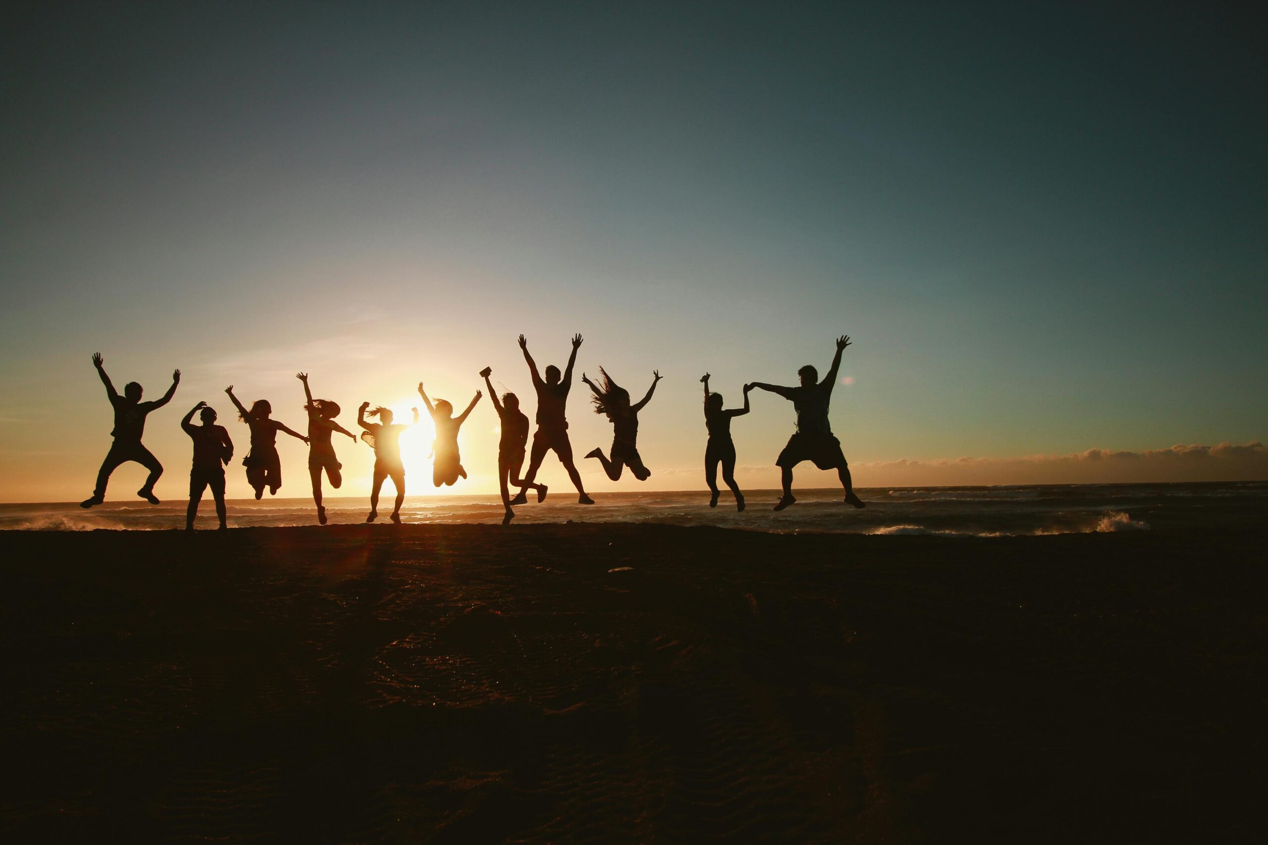 silhouette of friends at sunset